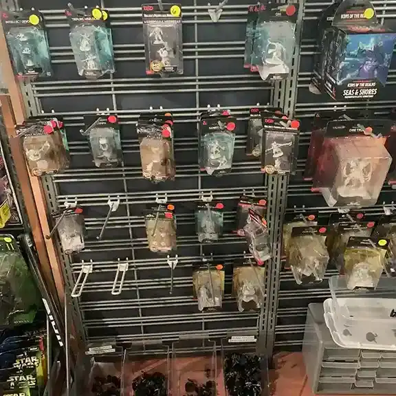 Another pegboard of packaged miniatures