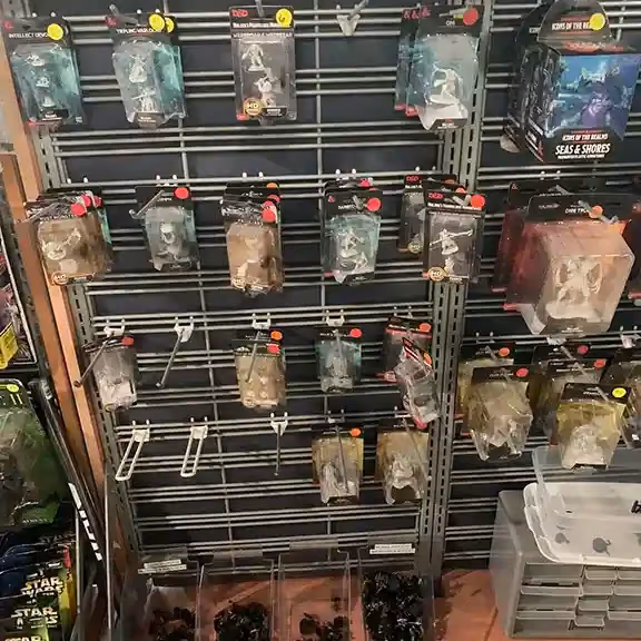 Another pegboard of packaged miniatures