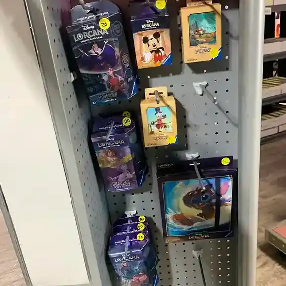 Trading card accessories and sleeves on a pegboard